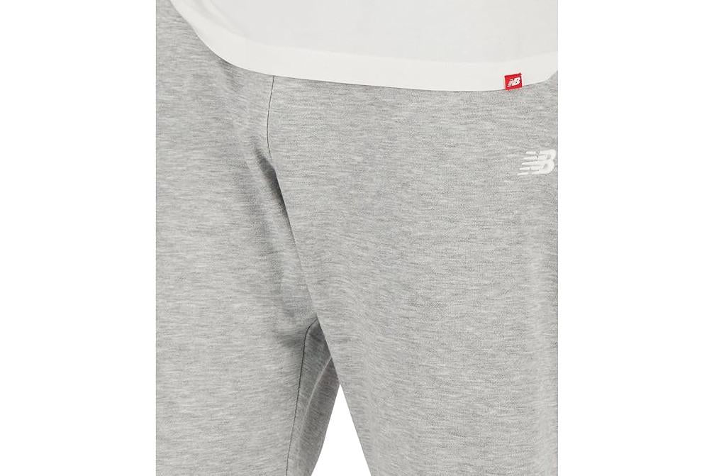 Pantalón Deportivo Hombre New Balance Sport Essentials French Terry Gris Cómodo y Versátil