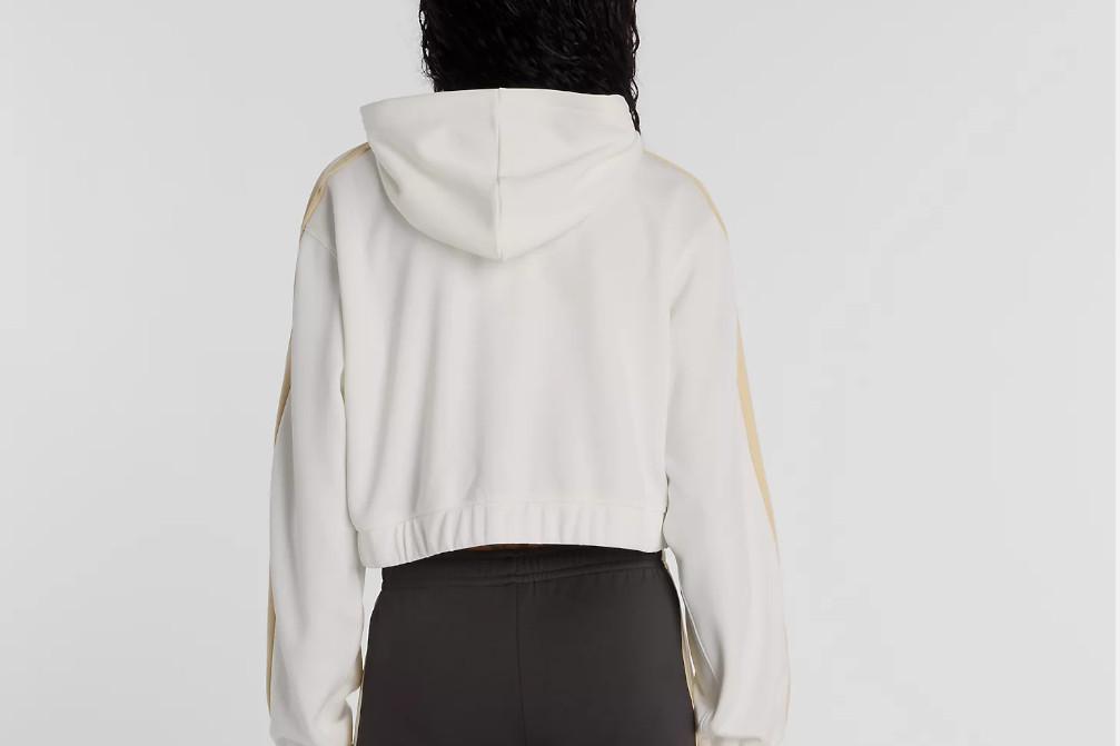 Chaqueta deportiva New Balance WJ61B759SST de color blanco