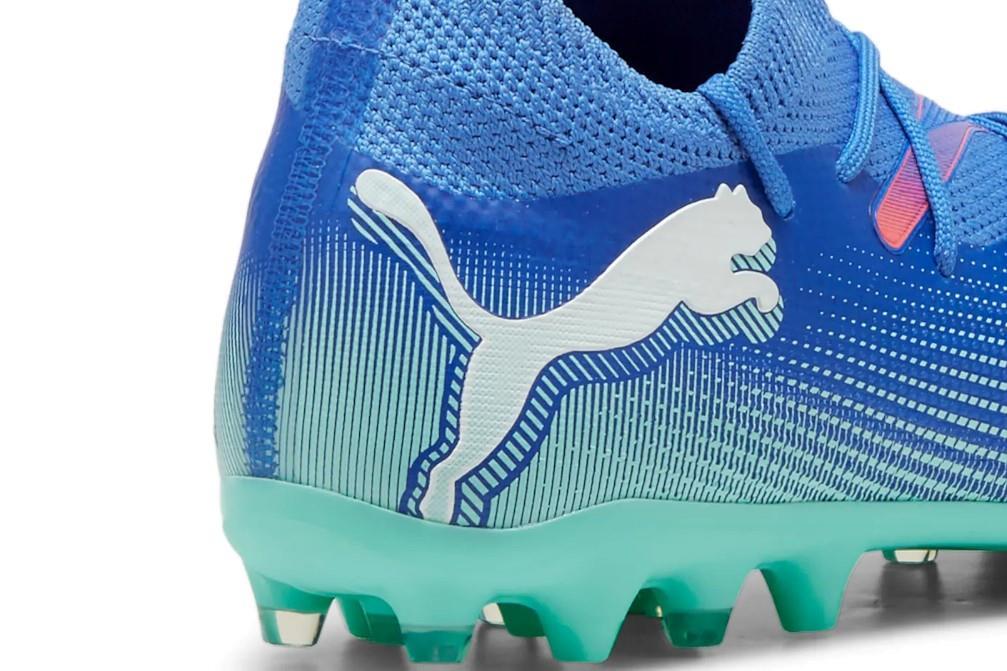 Zapatillas de fútbol Puma FUTURE 7 MATCH MG Jr 107946 en azul
