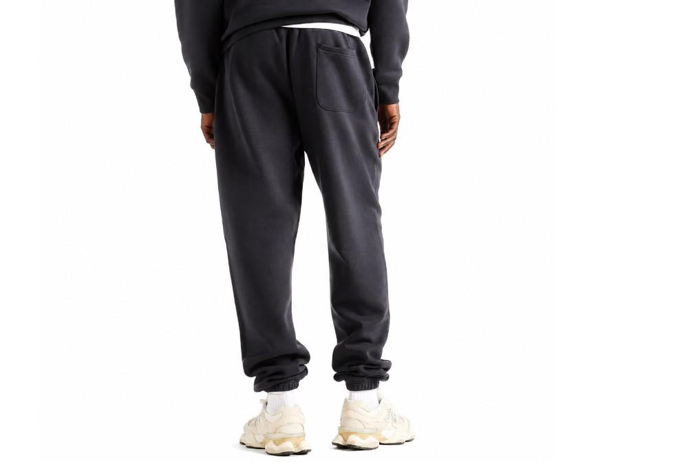 Pantalón largo New Balance Reimagined MB62S1NT Azul Marino Hombre