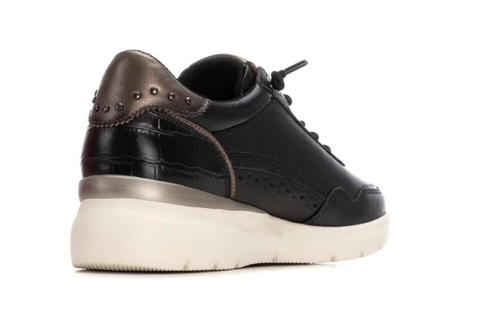 Zapatillas deportivas con cuña de Piel Carmela 162430 Metalizadas para Mujer en negro